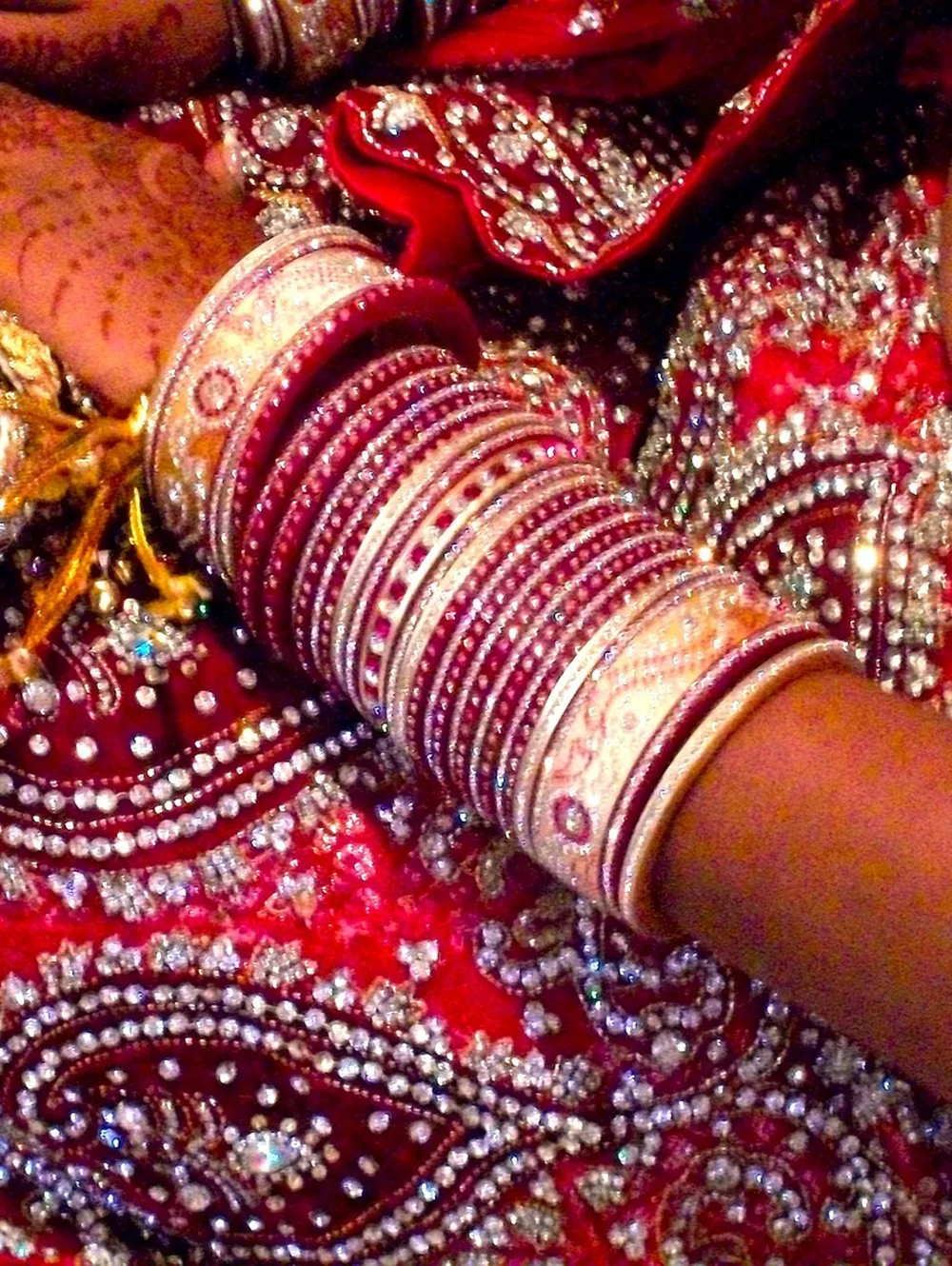 Zardozi embroidery and bridal bangles, close up