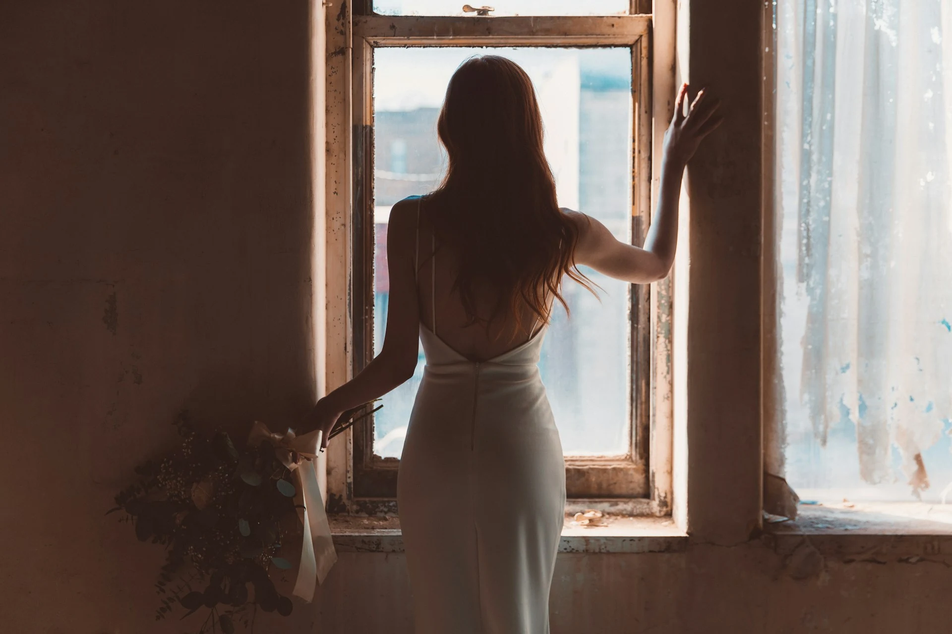 Silk gown by the window