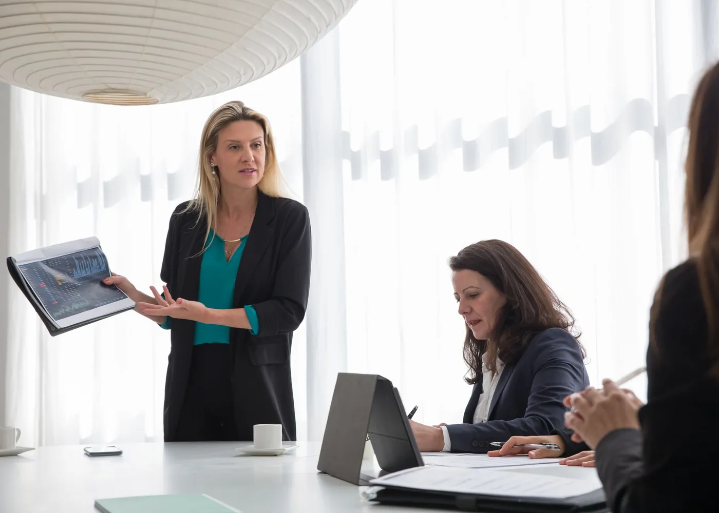 A marketing team reviewing work together